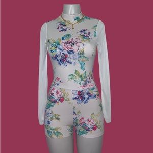 Floral romper with mesh sleeves